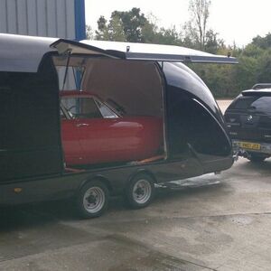 This winter let us collect your Ferrari in our covered trailer image
