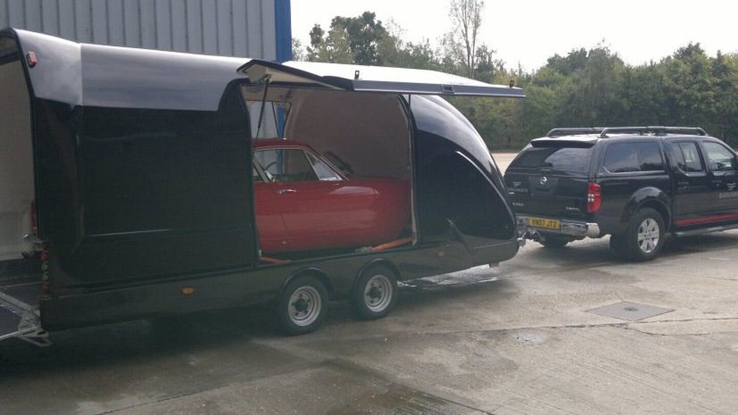 This winter let us collect your Ferrari in our covered trailer image